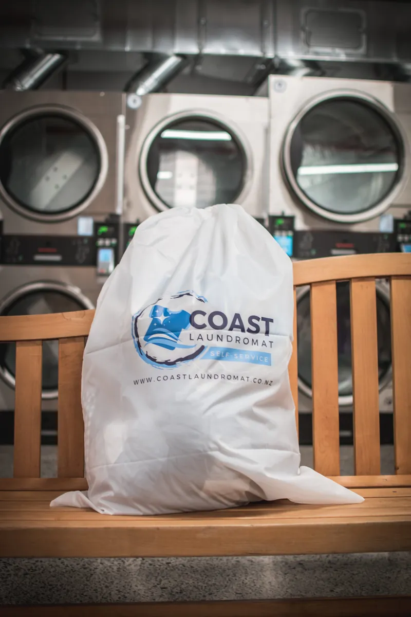 Detergent vending machine at Coast Laundromat Whangaparaoa — bags just $10